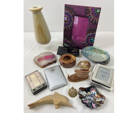 A collection of misc items to include a beaded photoframe, Abalone shell, quartz tealight holder, boxed Colibri lighter and e