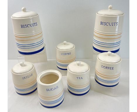 6 lidded ceramic kitchen storage jars by Arthur Woods. Cream ground with yellow and blue bands, together with 1 storage jar w