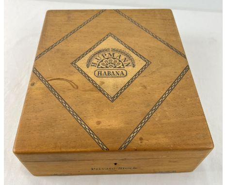 A vintage wooden H. Upmann Habana private stock cigar box with inlaid detail to lid. Original Cuban export label attached to 