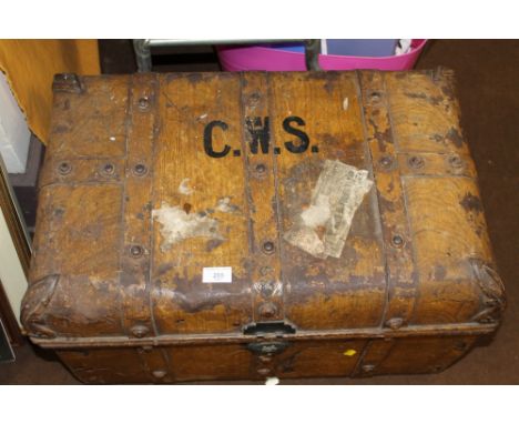 A VINTAGE TIN TRUNK