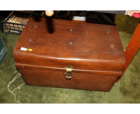 A VINTAGE TIN TRUNK