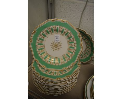 A group of Worcester Granger &amp; Co gilt decorated green ground plates and matching comport.
