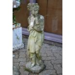 A reconstituted stone garden ornament modelled as a classical young lady.