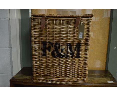 A Fortnum &amp; Mason wicker hamper (lacking contents).