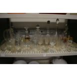 A shelf of glassware.