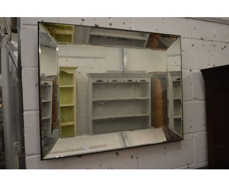 Modern rectangular wall mirror together with an Art Deco style mirror.