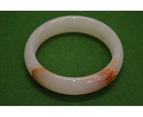A Chinese jade bangle.