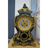 A decorative mantle clock.