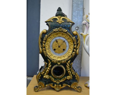 A decorative mantle clock.