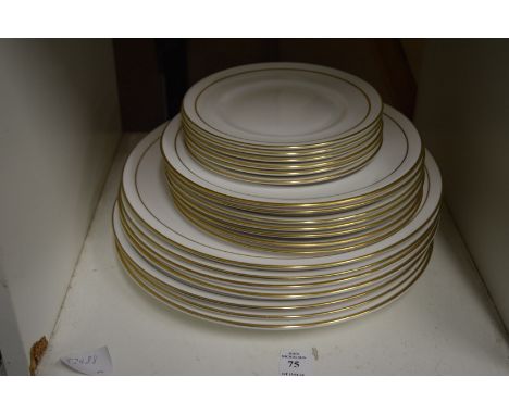 A collection of Royal Worcester Contessa plates and a boxed set of decorative champagne glasses.