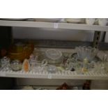 A shelf of glassware.