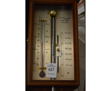 A Comitti stick barometer.