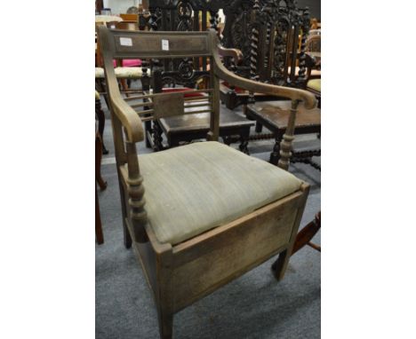 A 19th century mahogany commode chair.