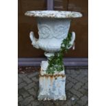 A good large campagna cast iron twin handled garden urn on pedestal base.