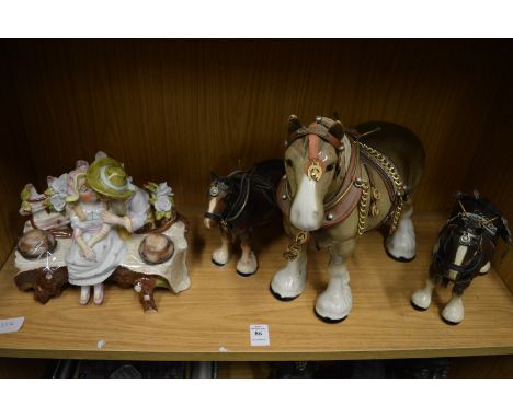 Models of Shire horses and a porcelain figural inkwell.