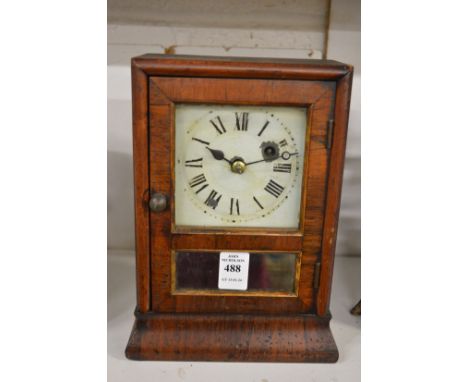 A small rosewood cased mantle clock.