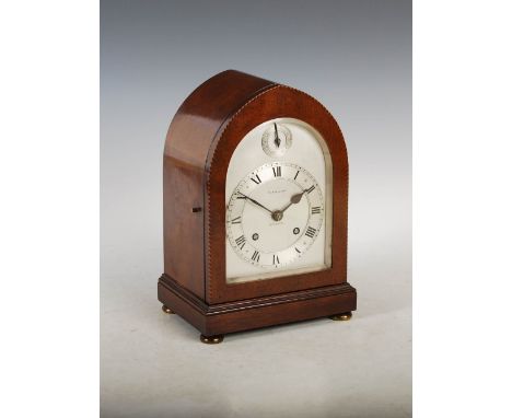 A late 19th/ early 20th century mahogany and chequer banded mantle clock R. STEWART, GLASGOW, the silvered dial with a Roman 