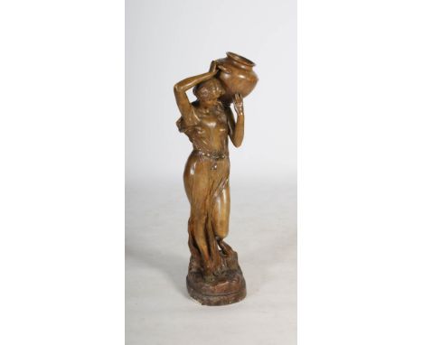 An early 20th century bronzed plaster figure of an Art Nouveau water carrier attributed to Goldscheider, modelled as a maiden