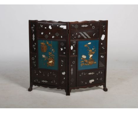 A late 19th century Aesthetic Movement two fold screen, set with two Japanese blue ground lacquer, mother of pearl and ivory 