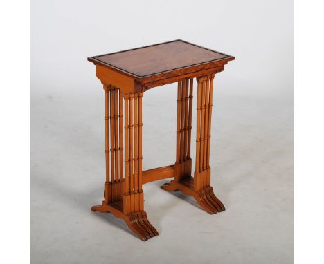 An early 20th century quartetto of satinwood, ebony lined and rosewood banded occasional tables, the rectangular tops with a 