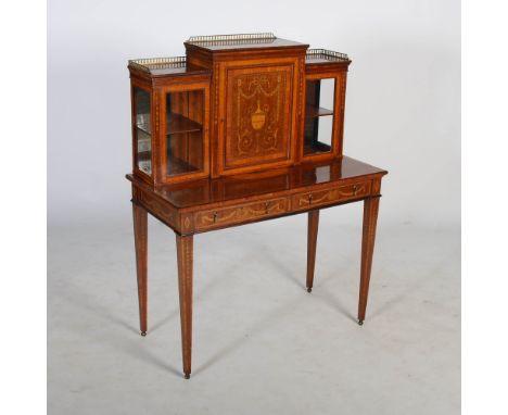 An Edwardian mahogany, satinwood and marquetry bonheur-de-jour, the upright back with a pierced brass gallery above a central