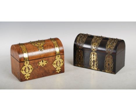 A Victorian walnut and brass bound tea caddy and a Victorian coromandel and brass bound stationary casket, the tea caddy with