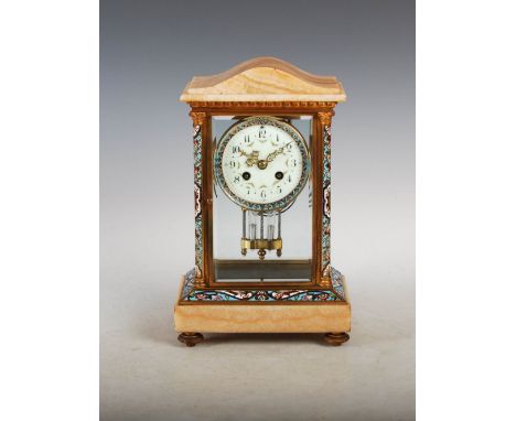 A late 19th/ early 20th century French onyx and champleve enamel mantle clock, the circular dial with Arabic numerals and twi