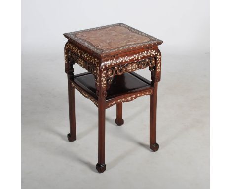 A Chinese dark wood, mother of pearl inlaid and marble topped jardiniere stand, Qing Dynasty, the square top with a shaped mo