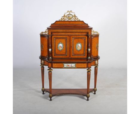 A late 19th century mahogany, amboyna, porcelain and gilt metal mounted bonheur-de-jour, the upper section with a rectangular