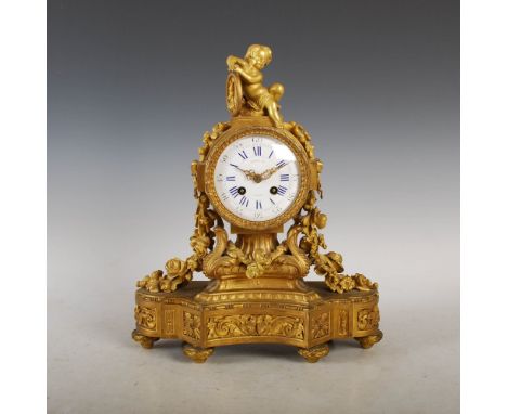 A 19th century French ormolu mantle clock RAINGO FRES. A PARIS, the 4" circular convex dial with Arabic and Roman numerals, t