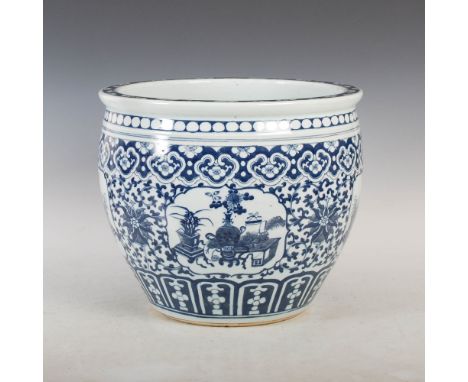 A Chinese porcelain blue and white fish bowl, late Qing Dynasty, decorated with four rectangular panels enclosing vases issui