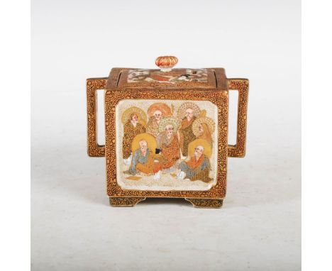 A Japanese Satsuma pottery koro and cover, Meiji Period, decorated with panels of lohan, the cover with chrysanthemum shaped 