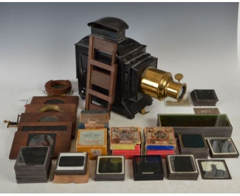 A 19th century magic lantern and assorted slides, to include; boxed Jack The Giant Killer, boxed Natural History, boxed Cinde