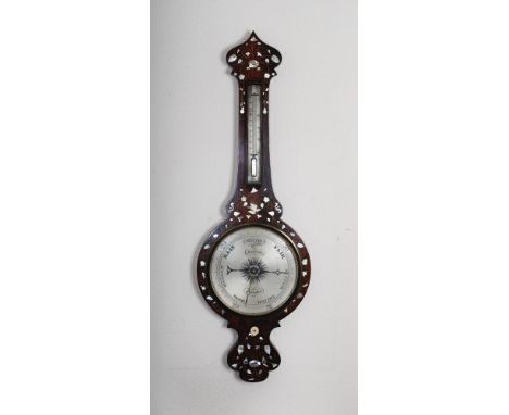 A 19th century rosewood and mother-of-pearl inlaid wheel barometer Rimmington, Lubenham, with silvered dials, 99.5cm long.