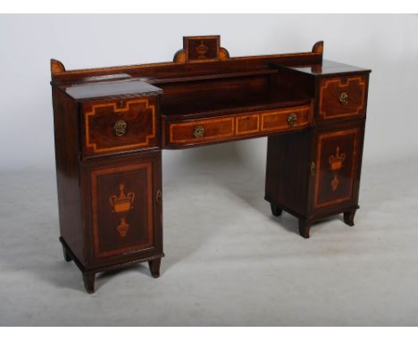 A William IV mahogany and satinwood banded sideboard, the upright gallery back centred with a rectangular tablet inlaid with 