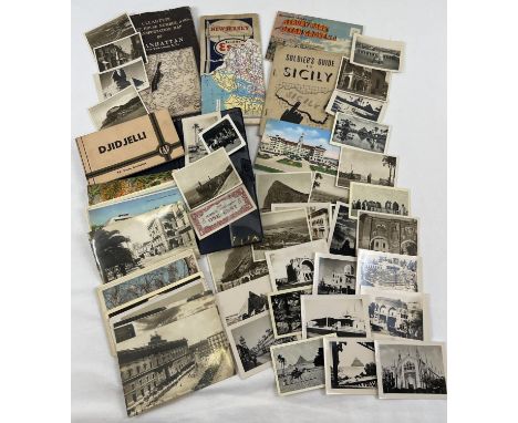 A collection of assorted WWII era photographs, postcards and ephemera. To include photographs of Egypt, Soldiers Guide to Sic