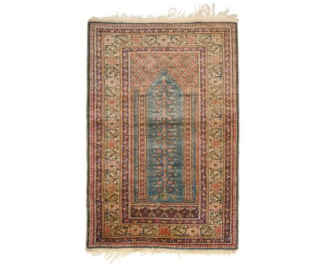 A KEYSERI NICHE RUG, WEST ANATOLIA, CIRCA 1920 the field with a pale blue niche flanked by columns, salmon plant filled spand