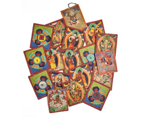 A COLLECTION OF SMALL BUDDHIST PAINTINGS (TSAKLI), TIBET, LATE 19TH/EARLY 20TH CENTURY gouache on paper, thirteen depicting a