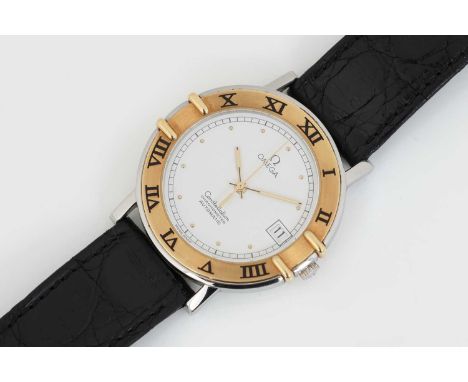 OMEGA Constellation Herrenarmbanduhr um 1990, Automatik Werk, rundes Gehäuse (D35mm), Stahl, mit vergoldeter Lünette mit schw