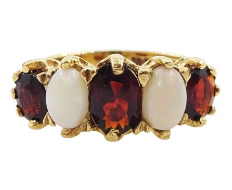 9ct gold five stone opal and garnet ring, hallmarkedCondition Report:Approx 3.85gm, size I-J, max depth = 8.5mm, good conditi