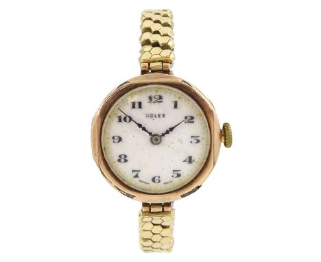 Rolex 9ct gold manual wind wristwatch, Glasgow import marks 1924, on expanding gilt strapCondition Report:Approx 21.8gm, move