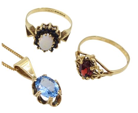 Gold oval blue topaz pendant necklace, opal and sapphire cluster ring and a gold single stone garnet ring, all 9ctCondition R