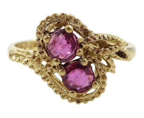 9ct gold two stone round ruby crossover ring, hallmarkedCondition Report:Approx 2.25gm, size L-M, 