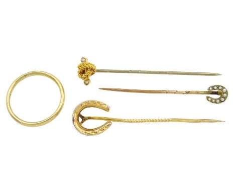 Two Victorian gold horseshoe stick pins, gold seed pearl knot stick pin and an 18ct gold wedding band, hallmarkedCondition Re