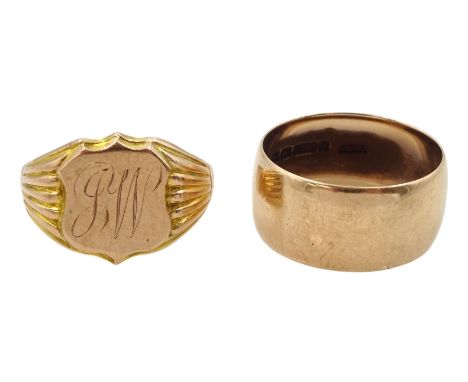 Early 20th century gold shield design signet ring, initialled J.W, Birmingham 1915 and a rose gold wide wedding band, both ha