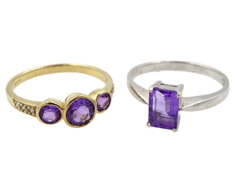 Yellow gold three stone amethyst ring, with diamond set shoulders and a white gold single stone amethyst ring, both hallmarke