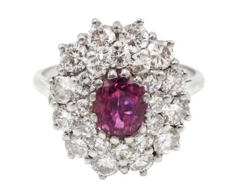 18ct white gold oval ruby and two row round brilliant cut diamond cluster ring, total diamond weight approx 1.20 caratConditi