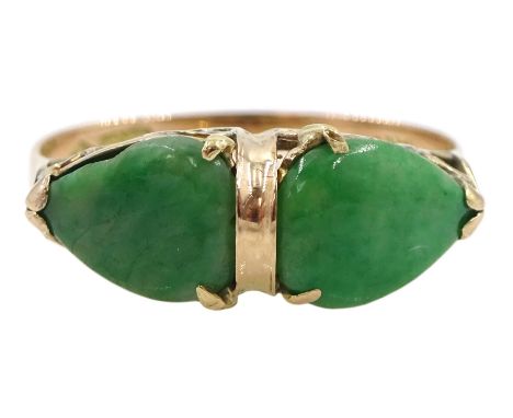 Gold two stone pear shaped jade ringCondition Report:Approx 2gm, stamped 14K tests 9ct gold, size P