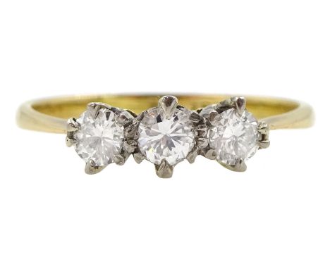 18ct gold three stone round brilliant cut diamond ring, stamped 18ct Plat, total diamond weight approx 0.35 caratCondition Re