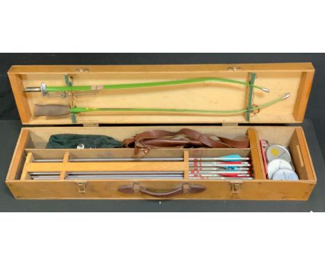 A vintage Apollo Kestrel silver Streak archery set, cased;  cap with vintage enamel pin badges etc 